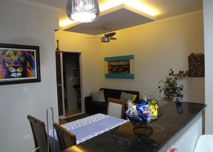 LINDO APTO COM PISCINA, SAUNA, SALÃO DE JOGOS, WIFI, AR CONDICIONADO e SACADA GOURMET NO ITAGUA Ubatuba